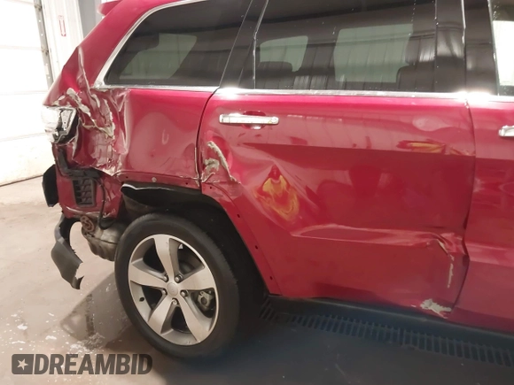 2014 Jeep Grand Cherokee Limited with VIN 1C4RJFBT1EC139798, listed as a IAAI auction lot 41772069 with 122,282 mi miles and . Bid and sale history available at DreamBid. Image 6.