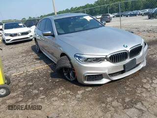 2020 BMW 5 Series M550i xDrive z VIN WBAJS7C00LCD98929, wystawiony jako IAAI lot #42371692 z przebiegiem Nie podano mil oraz . Historia ofert i sprzedaży dostępna na DreamBid. Obrazek 1.