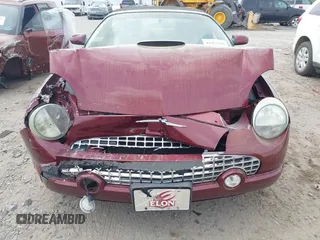 2004 Ford Thunderbird Deluxe z VIN 1FAHP60A24Y104500, wystawiony jako IAAI lot #41952791 z przebiegiem 100 795 mil mil oraz . Historia ofert i sprzedaży dostępna na DreamBid. Obrazek 13.