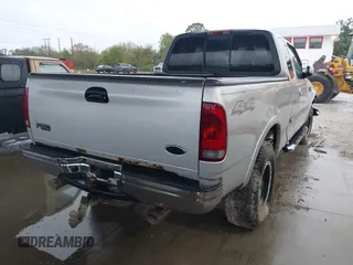 2003 Ford F-150 XL with VIN 1FTRX18W53NA09107, listed as a IAAI auction lot 41394520 with 187,489 mi miles. Bid and sale history available at carsss.com. Image 4.