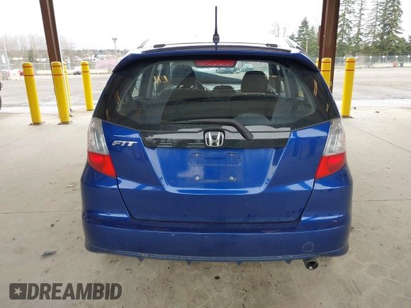 2009 Honda Fit Sport with VIN JHMGE88459C001743, listed as a IAAI auction lot 41852048 with 128,225 mi miles. Bid and sale history available at carsss.com. Image 17.