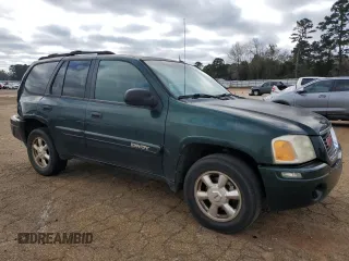 2004 GMC Envoy SLE with VIN 1GKDS13SX42234675, listed as a Copart auction lot 48780955 with 217,790 mi miles and Salvage Title. Bid and sale history available at carsss.com. Image 4.