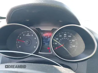 2014 Hyundai Veloster with VIN KMHTC6AD2EU214847, listed as a IAAI auction lot 42067728 with 77,421 mi miles. Bid and sale history available at carsss.com. Image 7.
