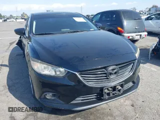 2016 Mazda 6 i Touring with VIN JM1GJ1V57G1444843, listed as a IAAI auction lot 41920436 with 154,863 mi miles and . Bid and sale history available at DreamBid. Image 1.