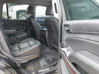 2015 GMC Yukon SLT with VIN 1GKS1BKC5FR274408, listed as a IAAI auction lot 41942157 with 165,978 mi miles. Bid and sale history available at carsss.com. Image 8.