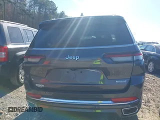 2022 Jeep Grand Cherokee Overland z VIN 1C4RJJDG6N8570854, wystawiony jako IAAI lot #40878737 z przebiegiem 19 947 mil mil oraz . Historia ofert i sprzedaży dostępna na DreamBid. Obrazek 17.