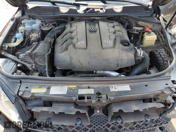 2015 Volkswagen Touareg Lux с VIN WVGEP9BP2FD004595, выставлен на аукционе Copart как лот 59020375 с пробегом 135 319 миль миль и Списание • Salvage title. История ставок и продаж доступна на DreamBid. Изображение 12.