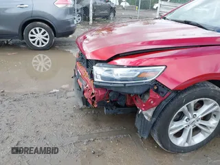 2018 Ford Taurus SEL z VIN 1FAHP2E85JG124997, wystawiony jako IAAI lot #42194985 z przebiegiem 86 456 mil mil oraz . Historia ofert i sprzedaży dostępna na DreamBid. Obrazek 19.