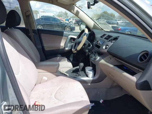 2008 Toyota RAV4 with VIN JTMZK33V686014973, listed as a IAAI auction lot 41684595 with 174,562 mi miles. Bid and sale history available at carsss.com. Image 5.