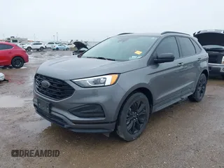 2023 Ford Edge SE z VIN 2FMPK4G95PBA41278, wystawiony jako IAAI lot #41964995 z przebiegiem 21 079 mil mil oraz . Historia ofert i sprzedaży dostępna na DreamBid. Obrazek 2.