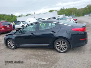 2015 Kia Optima SX Turbo with VIN 5XXGR4A69FG365072, listed as a IAAI auction lot 42295872 with 121,269 mi miles and . Bid and sale history available at DreamBid. Image 14.