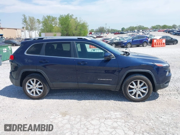 2015 Jeep Cherokee Limited z VIN 1C4PJMDS0FW551615, wystawiony jako IAAI lot #42080944 z przebiegiem 175 793 mil mil oraz . Historia ofert i sprzedaży dostępna na DreamBid. Obrazek 13.