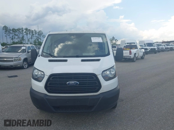 2019 Ford Transit with VIN 1FTYE1ZM3KKB46285, listed as a IAAI auction lot 42495117 with 234,622 mi miles and . Bid and sale history available at DreamBid. Image 12.