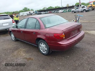 2001 Saturn SL z VIN 1G8ZG52821Z290428, wystawiony jako IAAI lot #42204275 z przebiegiem 171 478 mil mil oraz . Historia ofert i sprzedaży dostępna na DreamBid. Obrazek 3.