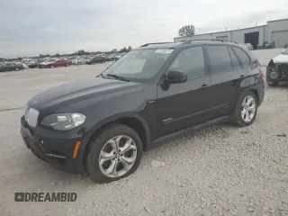 2013 BMW X5 xDrive50i with VIN 5UXZV8C51D0C14811, listed as a Copart auction lot 61396575 with 114,837 mi miles and Salvage title. Bid and sale history available at DreamBid. Image 1.