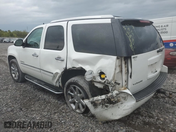 2013 GMC Yukon Denali with VIN 1GKS1EEF2DR279005, listed as a Copart auction lot 70446104 with 209,564 mi miles and Salvage Title. Bid and sale history available at carsss.com. Image 2.