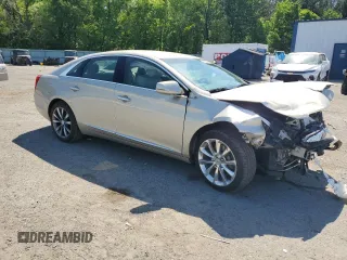 2013 Cadillac XTS z VIN 2G61N5S3XD9133261, wystawiony jako Copart lot #52939485 z przebiegiem 92 304 mil mil oraz Szkoda całkowita • Salvage title. Historia ofert i sprzedaży dostępna na DreamBid. Obrazek 4.
