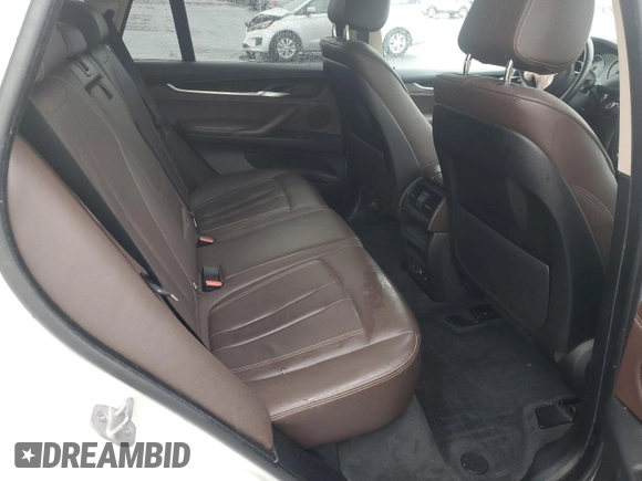 2014 BMW X5 xDrive35i with VIN 5UXKR0C50E0K42458, listed as a Copart auction lot 52069455 with 146,602 mi miles and Salvage Title. Bid and sale history available at carsss.com. Image 12.