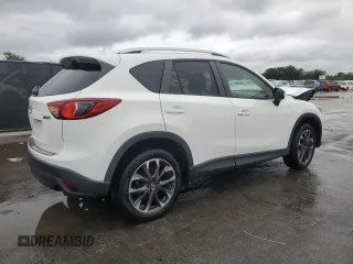 2016 Mazda CX-5 Grand Touring with VIN JM3KE2DYXG0839774, listed as a Copart auction lot 52336275 with 125,605 mi miles and Salvage Title. Bid and sale history available at carsss.com. Image 3.
