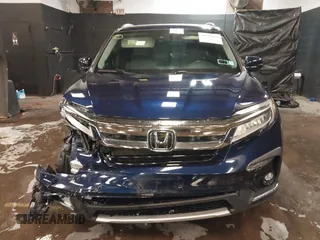 2022 Honda Pilot Touring 7-Passenger with VIN 5FNYF6H65NB052164, listed as a IAAI auction lot 41641601 with 51,700 mi miles. Bid and sale history available at carsss.com. Image 12.