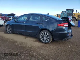 2020 Ford Fusion SE z VIN 3FA6P0T9XLR236729, wystawiony jako Copart lot #47771045 z przebiegiem 54 947 mil mil oraz Szkoda całkowita • Salvage title. Historia ofert i sprzedaży dostępna na DreamBid. Obrazek 2.