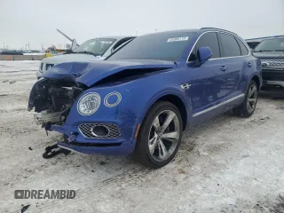 2017 Bentley Bentayga W12 z VIN SJAAC2ZV2HC014080, wystawiony jako Copart lot #44806115 z przebiegiem 63 077 mil mil oraz Szkody całkowita. Historia ofert i sprzedaży dostępna na DreamBid. Obrazek 1.