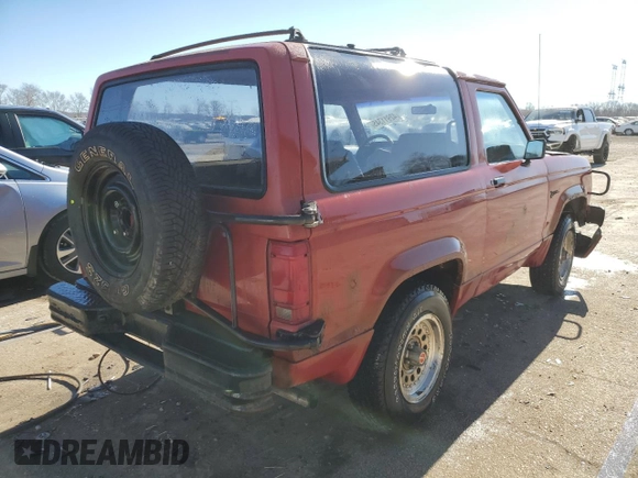 1988 Ford Bronco с VIN 1FMCU14T2JUB33747, выставлен на аукционе Copart как лот 42911345 с пробегом 31 761 миль миль и Списание • Salvage title. История ставок и продаж доступна на DreamBid. Изображение 3.