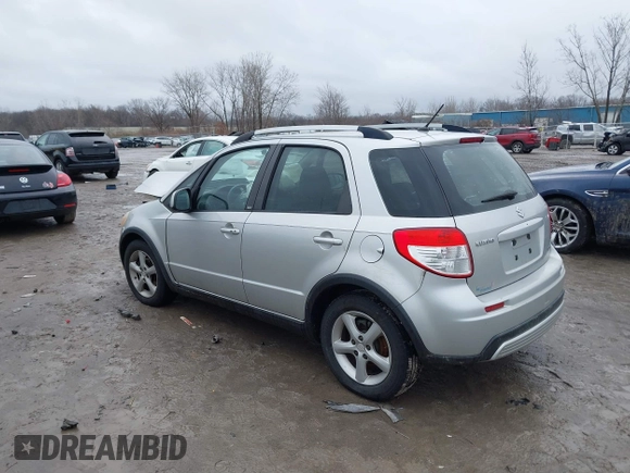 2007 Suzuki SX4 Man Touring Pkg AWD with VIN JS2YB417475102405, listed as a IAAI auction lot 41106931 with 170,315 mi miles. Bid and sale history available at carsss.com. Image 3.