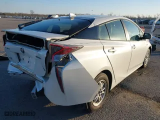 2017 Toyota Prius Two with VIN JTDKARFU3H3034271, listed as a IAAI auction lot 41585579 with 82,383 mi miles. Bid and sale history available at carsss.com. Image 4.