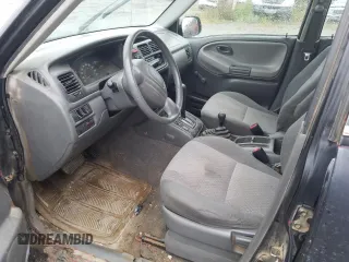 2003 Chevrolet Tracker z VIN 2CNBJ13C236901119, wystawiony jako Copart lot #68736774 z przebiegiem Nie podano mil oraz Szkoda całkowita • Salvage title. Historia ofert i sprzedaży dostępna na DreamBid. Obrazek 7.
