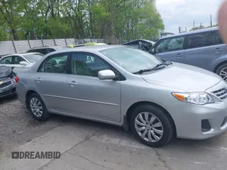 2013 Toyota Corolla L with VIN 2T1BU4EEXDC052854, listed as a IAAI auction lot 42230118 with 156,120 mi miles and . Bid and sale history available at DreamBid. Image 13.