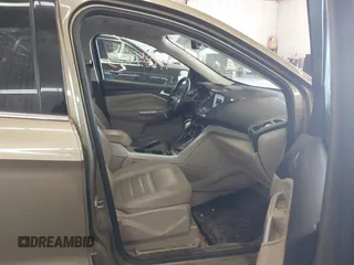 2013 Ford Escape SEL with VIN 1FMCU0HX0DUB83459, listed as a IAAI auction lot 41985453 with 198,182 mi miles and . Bid and sale history available at DreamBid. Image 5.