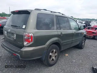 2006 Honda Pilot EX-L with VIN 5FNYF18776B011211, listed as a IAAI auction lot 39555749 with 295,998 mi miles and . Bid and sale history available at DreamBid. Image 4.