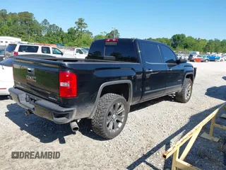 2015 GMC Sierra 1500 Denali with VIN 3GTU2WEJ6FG400004, listed as a IAAI auction lot 42097356 with 148,544 mi miles and . Bid and sale history available at DreamBid. Image 4.