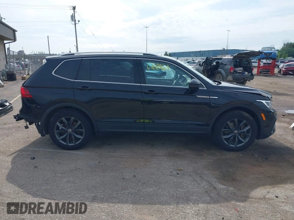 2023 Volkswagen Tiguan SE with VIN 3VVMB7AXXPM003447, listed as a IAAI auction lot 42566061 with 39,185 mi miles and . Bid and sale history available at DreamBid. Image 13.