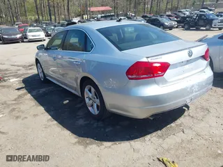 2014 Volkswagen Passat Wolfsburg Ed with VIN 1VWAS7A32EC048814, listed as a IAAI auction lot 41858198 with 112,436 mi miles. Bid and sale history available at carsss.com. Image 3.