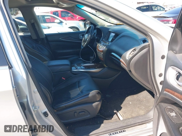 2013 Infiniti JX35 with VIN 5N1AL0MMXDC345352, listed as a IAAI auction lot 40145431 with 105,286 mi miles and . Bid and sale history available at DreamBid. Image 5.