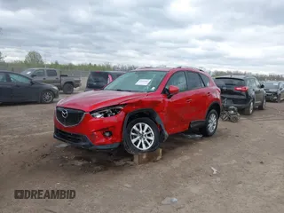 2014 Mazda CX-5 Touring z VIN JM3KE2CY3E0424892, wystawiony jako IAAI lot #42016801 z przebiegiem 173 350 mil mil oraz . Historia ofert i sprzedaży dostępna na DreamBid. Obrazek 18.