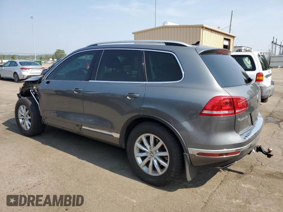 2015 Volkswagen Touareg Lux с VIN WVGEP9BP2FD004595, выставлен на аукционе Copart как лот 59020375 с пробегом 135 319 миль миль и Списание • Salvage title. История ставок и продаж доступна на DreamBid. Изображение 2.