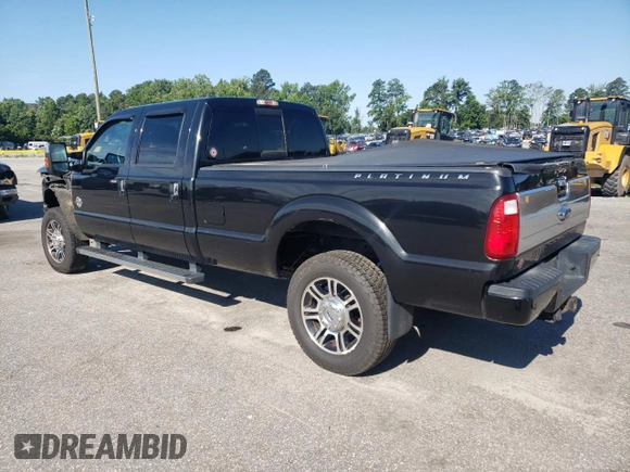 2015 Ford F-350 Platinum z VIN 1FT8W3BTXFEA30693, wystawiony jako Copart lot #61465335 z przebiegiem 296 574 mil mil oraz Szkoda całkowita • Salvage title. Historia ofert i sprzedaży dostępna na DreamBid. Obrazek 2.