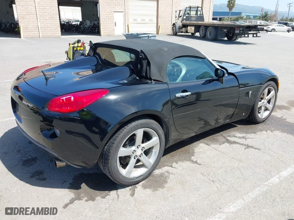 2007 Pontiac Solstice with VIN 1G2MB35B07Y105757, listed as a IAAI auction lot 42008293 with 135,739 mi miles. Bid and sale history available at carsss.com. Image 4.