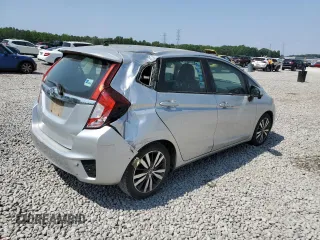 2015 Honda Fit EX-L with VIN 3HGGK5H84FM708209, listed as a Copart auction lot 59337085 with 130,355 mi miles and Salvage title. Bid and sale history available at DreamBid. Image 3.