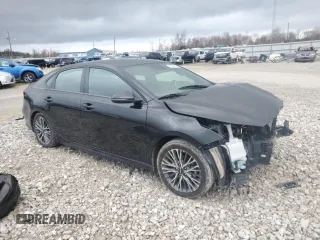 2023 Kia Forte GT-Line with VIN 3KPF54AD5PE601698, listed as a Copart auction lot 83233624 with 27,707 mi miles and Salvage Title. Bid and sale history available at carsss.com. Image 4.