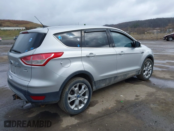 2013 Ford Escape SEL with VIN 1FMCU9H93DUA81448, listed as a IAAI auction lot 41790631 with 176,015 mi miles. Bid and sale history available at carsss.com. Image 4.