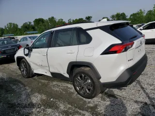 2024 Toyota RAV4 Hybrid XLE Premium with VIN 4T3B6RFV1RU174487, listed as a Copart auction lot 57208645 with 9,911 mi miles and Salvage title. Bid and sale history available at DreamBid. Image 2.