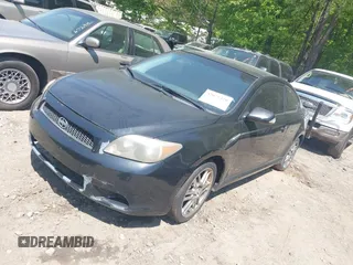 2005 Scion tC with VIN JTKDE177750026736, listed as a IAAI auction lot 42075370 with 246,192 mi miles. Bid and sale history available at carsss.com. Image 2.