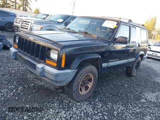 2000 Jeep Cherokee z VIN 1J4FF48S5YL260176, wystawiony jako IAAI lot #41381885 z przebiegiem Nie podano mil oraz . Historia ofert i sprzedaży dostępna na DreamBid. Obrazek 17.