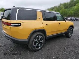 2023 Rivian R1S Adventure z VIN 7PDSGABA1PN009442, wystawiony jako Copart lot #55835815 z przebiegiem 28 048 mil mil oraz Szkody całkowita. Historia ofert i sprzedaży dostępna na DreamBid. Obrazek 3.