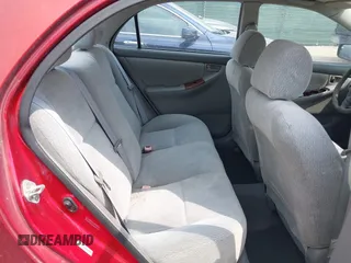 2004 Toyota Corolla CE with VIN 1NXBR32E14Z265397, listed as a IAAI auction lot 42182313 with 200,035 mi miles. Bid and sale history available at carsss.com. Image 8.