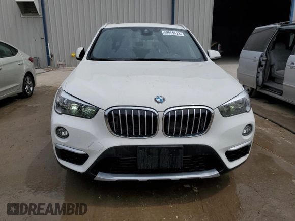 2019 BMW X1 sDrive28i with VIN WBXHU7C57K5L10243, listed as a Copart auction lot 48959423 with 42,248 mi miles and . Bid and sale history available at DreamBid. Image 5.